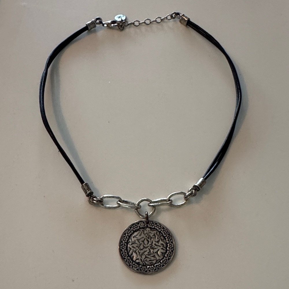 Silpada sterling silver sunburst with black leather